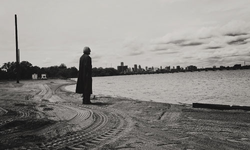 John Hern standing in front of Lake St. Clair